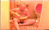 Chubby guy masturbating after drinking wine