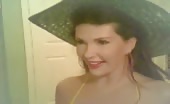 Beautiful babe peeing in a glass