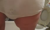 Old lady shitting in white panties