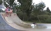 Two girls peeing on a ramp
