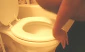 Ebony girl shitting in toilet