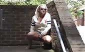 Blonde babe peeing on front porch