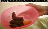 Shitting in a pink bowl