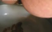 Fat girl shitting in toilet
