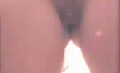 Ebony girl peeing on bathroom floor