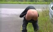 Hot tanned girl shitting outdoor