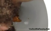 Close up of a black girl shitting