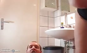 Busty mistress smears shit on her male slave
