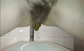 Hairy milf peeing and shitting in public bathroom