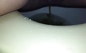 Shaved girl peeing and pooping