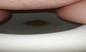 Chubby babe pooping in toilet
