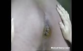 Shitting on girlfriend's naked body