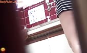 Two Japanese girls pooping