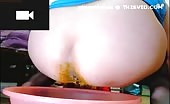 Chinese girl smears shit on her feet