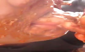 Teen boy rubbing crap on his face to eat it all
