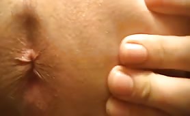 Hairy man has diarheea in close up