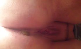 BBW wife pooping a brown turd in close up