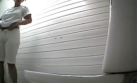Chubby wife caught pooping in a deposit