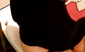 Wearing a Ghostbusters shirt while pooping