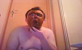 Teen boy smearing crap on his face