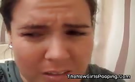 Chubby brunette wife shitting in the toilet