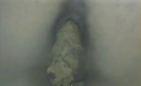 Young Italian girl using a public bathroom