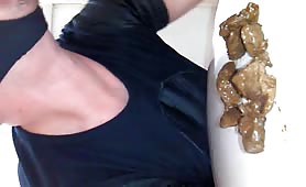 Eating a very long brown turd