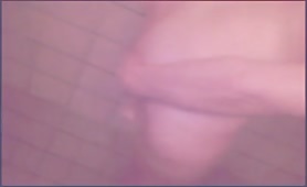 BBW sits naked on her knees as she's drinking pee