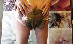 Dildoing his ass after pooping in plastic undies