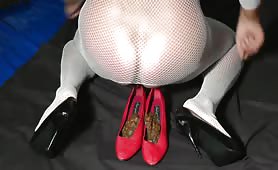 Shemale pooping on red high heels