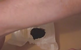 Shaved balls with a pair of white diapers