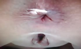 Young blonde peeing and pooping in close up
