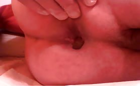 Creamy shit on a white napkin on the bed
