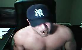 Muscular gay guy smearing shit on his body