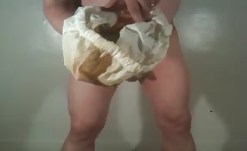 Smearing poop on his head and hair