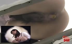 Young Japanese girl shitting in a public bathroom