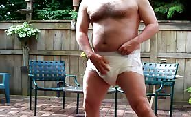 Jerking off hard outdoor