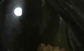 Skinny brunette rubbing crap on her naked body