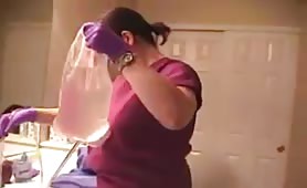 Mother and daughter doing enema