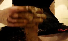 Brown poop on his cock while masturbating