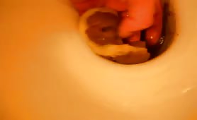 Playing with poop from toilet