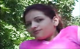 Young brunette shitting outdoor