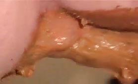 Scat MILF dildoing her ass