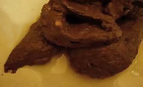 Long turd in close up