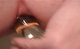 Sexy MILF dildoing her ass
