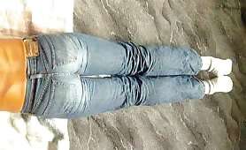 Shitting in his blue jeans