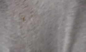 Shitting in grey pants