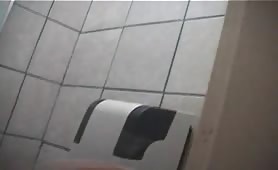 Teen girl shitting in a public bathroom stall