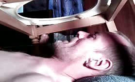 Holding a turd in his mouth