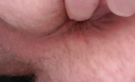 Hairy guy fingering his ass